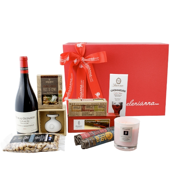 Contents of the Elenianna Luxury Greek Christmas Box, showing gourmet Greek food, Xinomavro wine, Ladolea EVOO, PDO pistachios, and the signature red gift box.