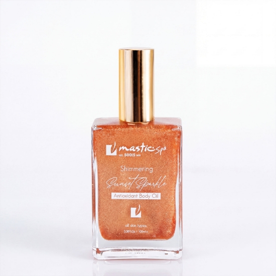 Mastic Spa Sunset Sparkle Shimmering Dry Oil 100ml bottle featuring PGI Chios Mastic and Vitamin C.